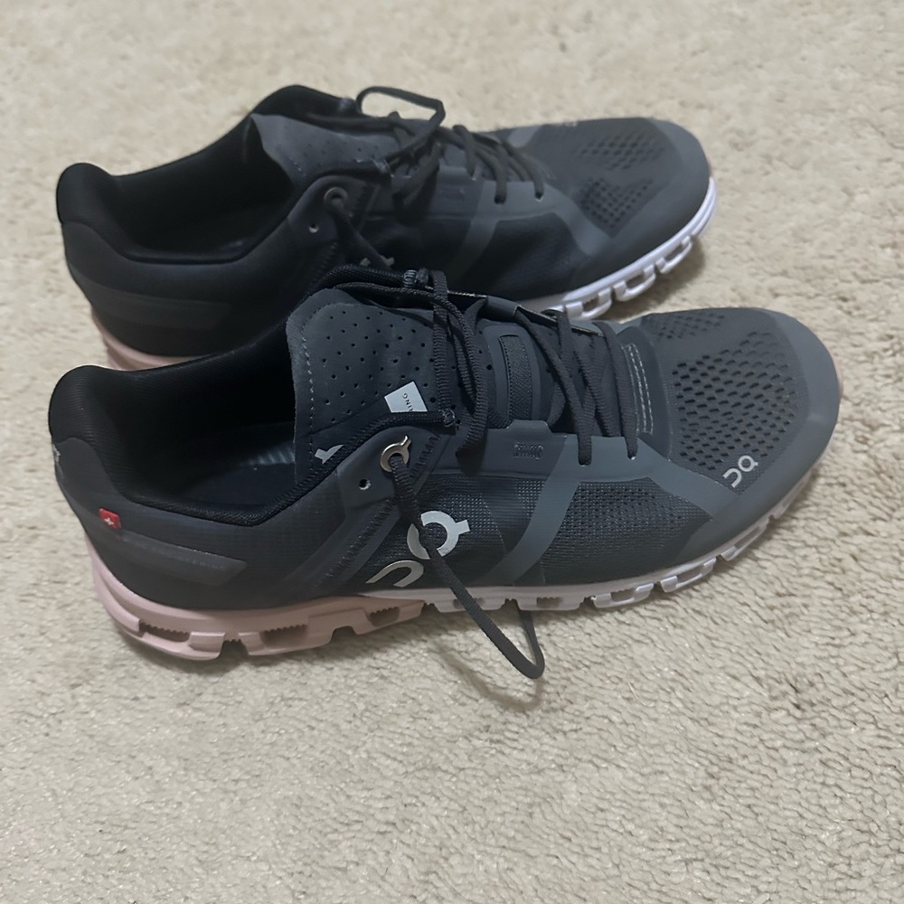 On Running Gray and Pink Sneakers with CloudTec Cushioning